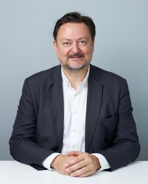 Alex Reynolds, EVP, Group Chief Corporate Development Officer